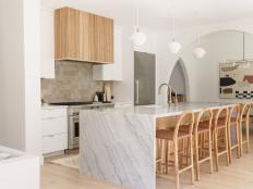 Marble Waterfall Edge Kitchen Island, Five Barstools, Wood Range Hood