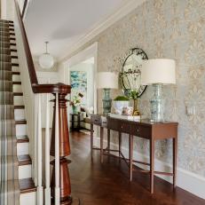 Traditional Foyer With Elegant Wallpaper