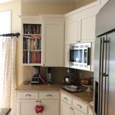 Before: Crowded Kitchen With Dark Countertops