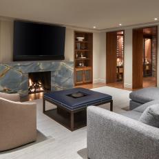 Transitional Family Room With Blue Fireplace