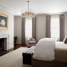 Transitional Bedroom With Marble Fireplace
