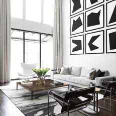 Monochromatic Living Room With Abstract Art