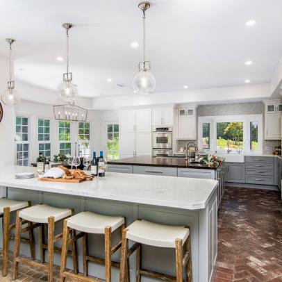 Transitional Kitchen With Marble Topped Island