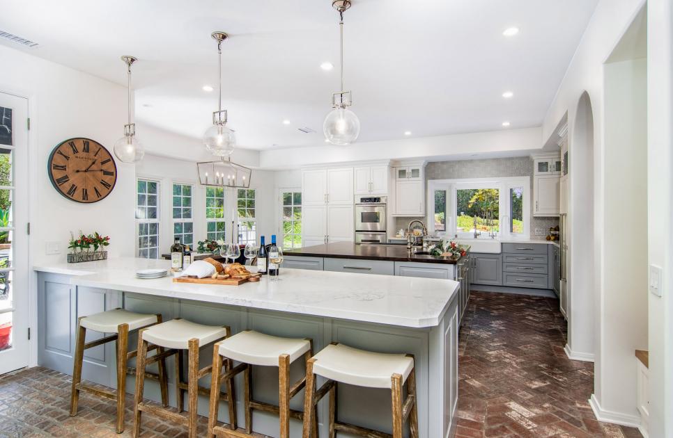 Transitional Kitchen With Marble Topped Island