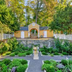 Mid 19th Century Revival Yellow Garden Shed and Formal Garden