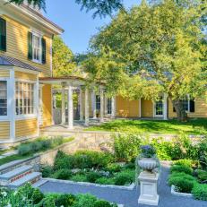 Historic Homestead With 19th Century Yellow Farmhouse and Formal Garden