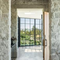 Stone Walls and Floor-to-Ceiling Windows in Country Home