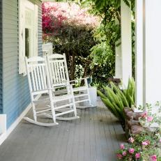 Front Porch With White Rocking Chairs