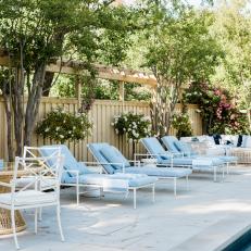 Blue Lounge Chairs By Pool
