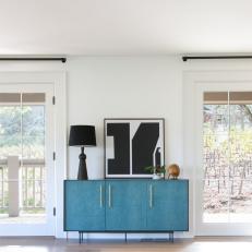 Blue Cabinet and Black Lamp