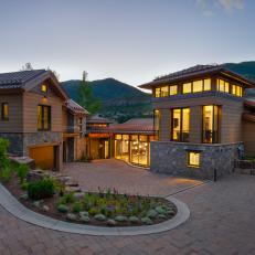 Contemporary, Rustic Mountain Vacation Home With Curving Brick Driveway