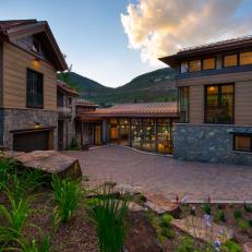 Contemporary Mountain Vacation Home With Natural Brick and Stone Entryway