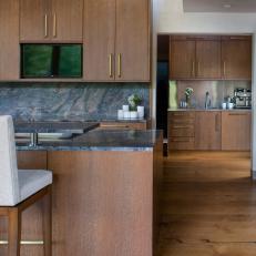 Contemporary, Rustic Kitchen With Sleek Wood Cabinets and Gray Granite