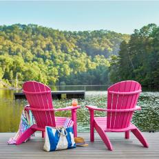 Red Adirondack Chairs and Lake