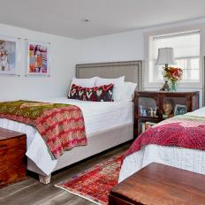 Eclectic Multicolored Bedroom With Red Rug