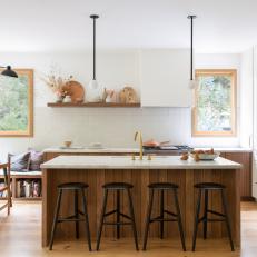 Modern Eat-In Kitchen With Wood Panel Island