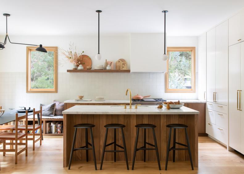 Eat-In Kitchen With Wood Panel Island, Black Barstools