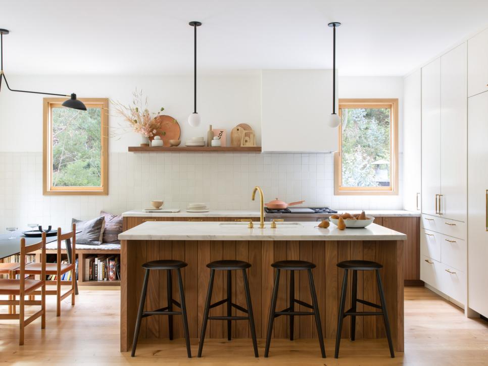 Eat-In Kitchen With Wood Panel Island, Black Barstools