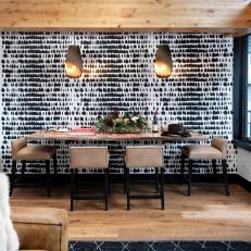 Contemporary Dining Room With Floating Table and Black-and-WhiteAccent Wall