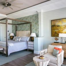 Coastal Bedroom With Canopy Bed and Accent Wall