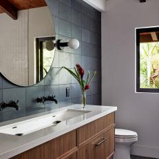 Rustic Bathroom With Navy Tile Walls
