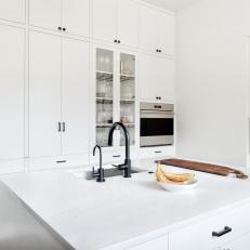 White Butler's Kitchen With Floor-to-Ceiling Cabinets