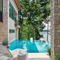 Backyard With Infinity Pool and Lake Views