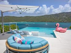 Waterfront Infinity Pool With Flamingo Float