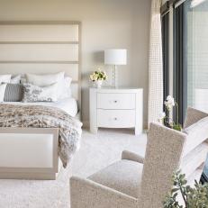 Neutral Transitional Bedroom With Linen Armchair