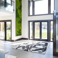 Modern Foyer With Green Art