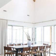 Wooden Dining Table Under Vaulted Ceiling