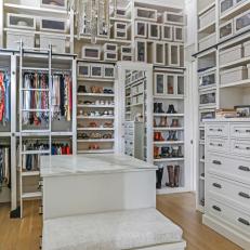 White Walk In Closet With Boxes