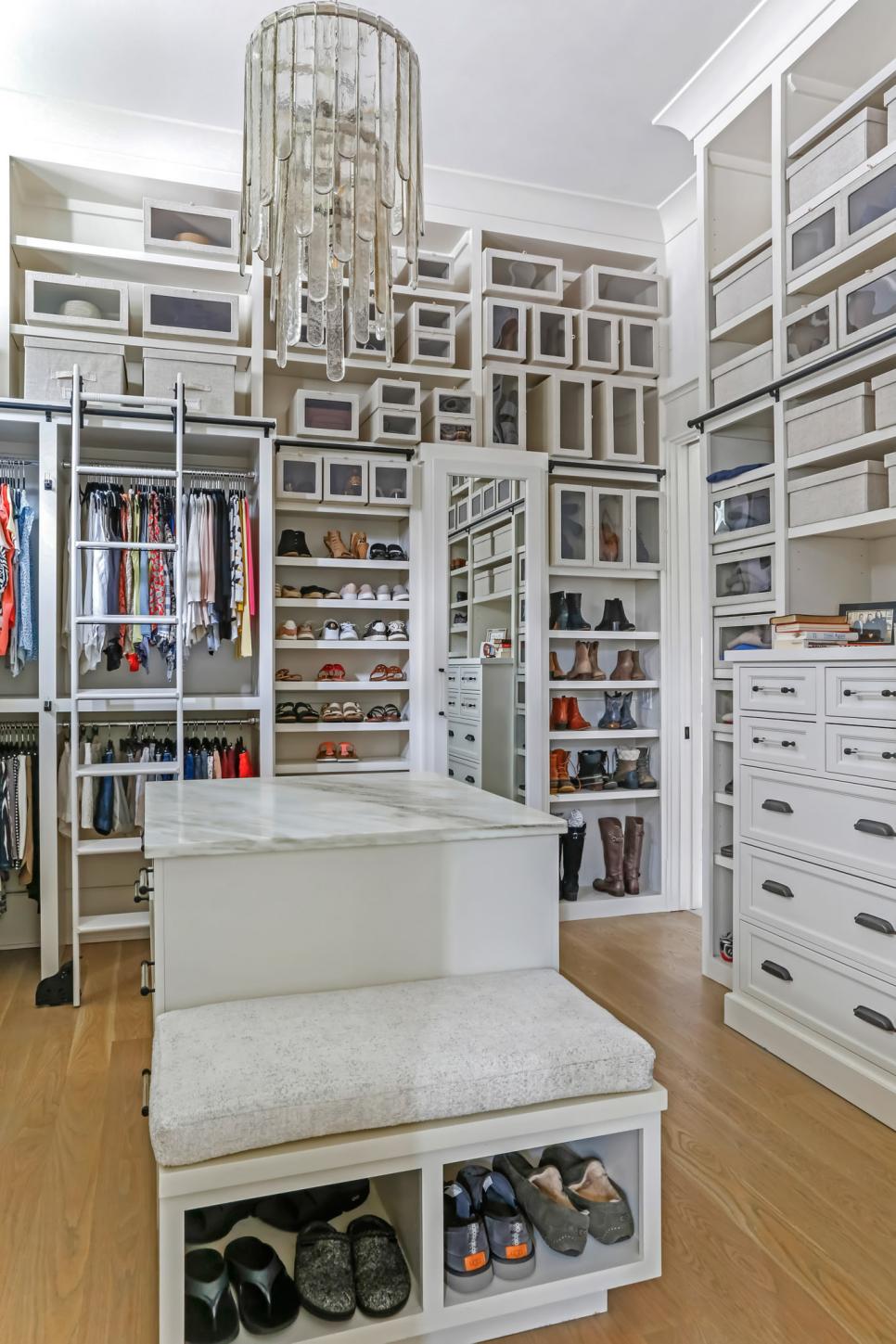 White Walk In Closet With Boxes HGTV
