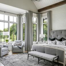 Gray Transitional Bedroom With Two Chairs