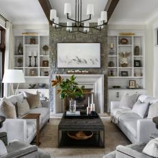 Neutral Transitional Living Room With White Shelves