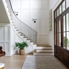 White Transitional Foyer With Staircase