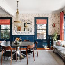 Gorgeous Dining Room With Blue Built-Ins and Matching Wainscoting