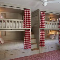 Bunk Room With Gingham Red and White Curtains
