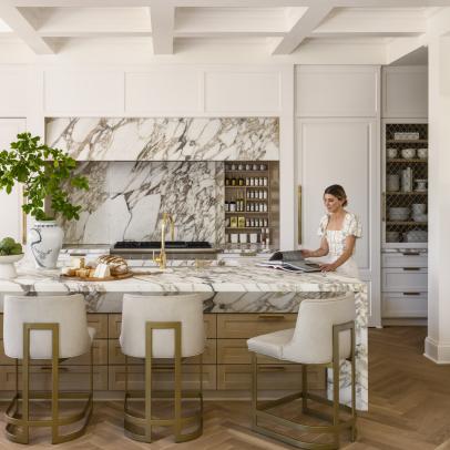 White Contemporary Chef's Kitchen With Marble Wall