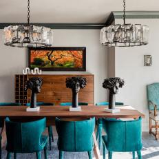 Eye-Catching & Eclectic Dining Room With Turquoise Chairs