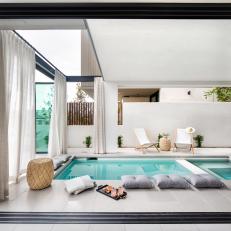 Panoramic Sliding Door to Covered Lap Pool
