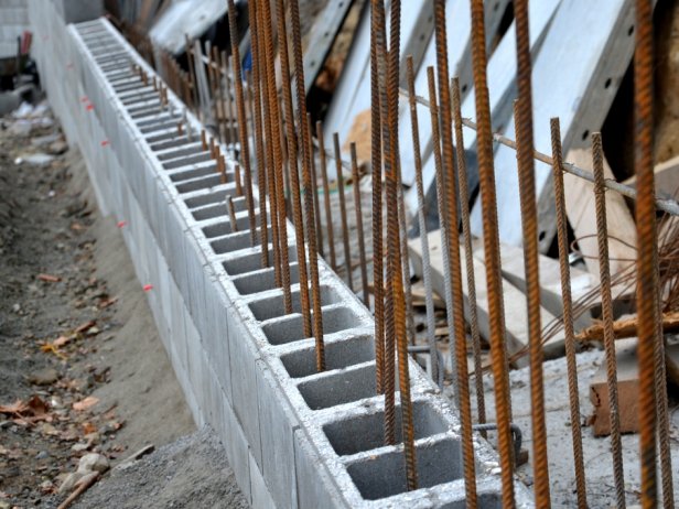 Planning and Building a Concrete Block Retaining Wall | HGTV