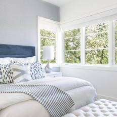 Transitional Bedroom With Blue Accent Wallpaper