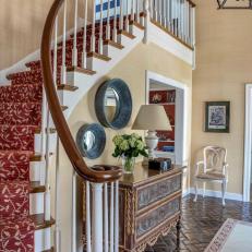 Traditional Foyer With Red Stair Runner