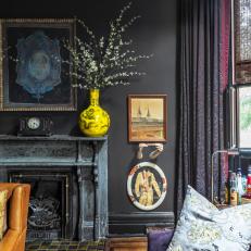 Black Eclectic Sitting Room With Yellow Vase