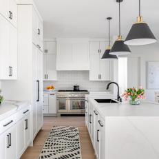 Black and White Kitchen With Pink Tulips