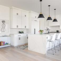 White Open-Plan Kitchen With Black Accents
