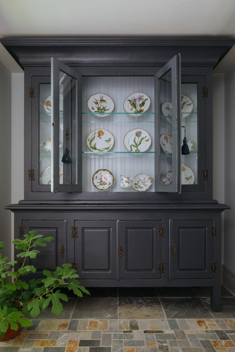 A Small Nook Features an Antique China Cabinet