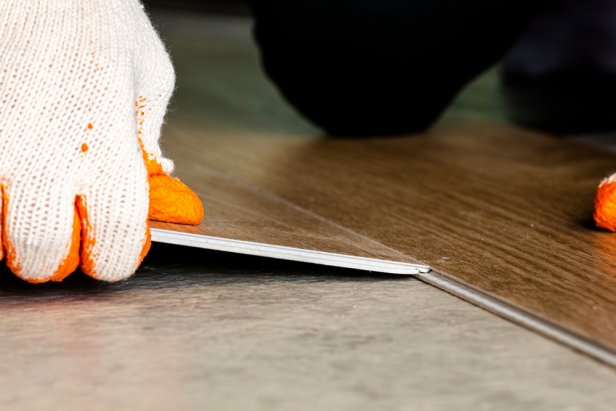 Close up on Decoration Interior design for new flooring by installing click lock vinyl wood tile to renovate on floor