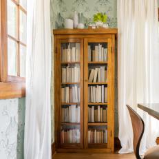 Bookshelf and Green Wallpaper